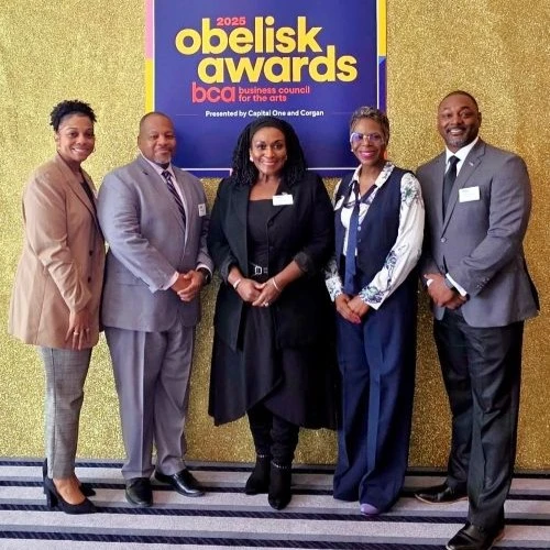 Peterbilt and Obelisk Business Council for the Arts dignitaries in front of 2025 Obelisk Awards sign