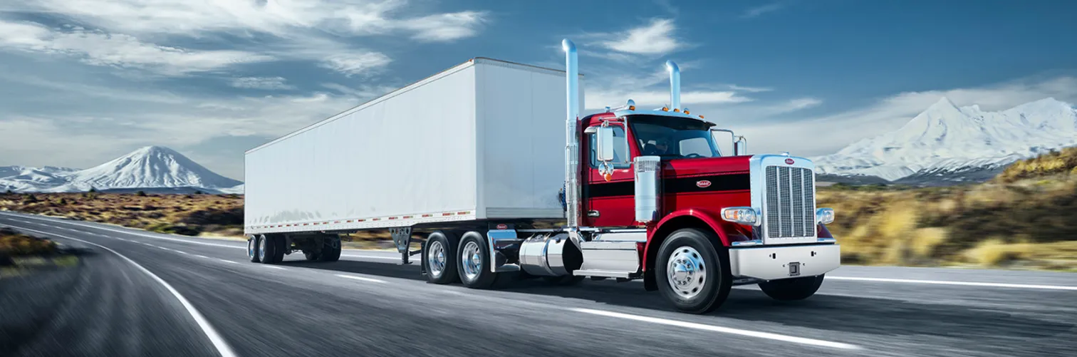 Banner Background - Peterbilt’s suite of connected services is a superpower for keeping your fleet on the road and operating at peak performance and efficiency. It accomplishes this by arming you with real-time knowledge and data about everything happening with your trucks.